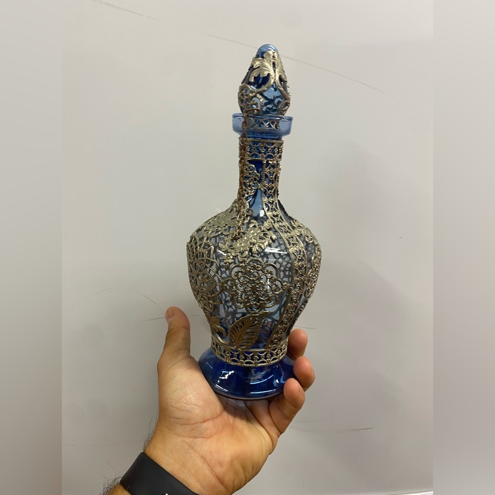 Blue glass liquor bottle